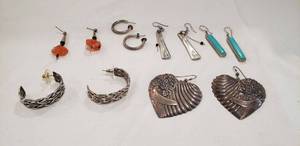 lot 706 image: Sterling silver earrings 6 ct.  Includes a pair of signed Jomil pair.