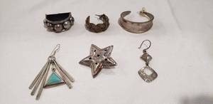 lot 709 image: Taxco sterling selection. Includes 6 single earrings. All marked Taxco and sterling