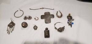 lot 713 image: Sterling selection (unmarked). Client indicates sterling, please preview. Nothing attracts a magnet.