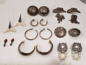 lot 714 image: Sterling earring selection (unmarked). 9 ct. Client indicates sterling. Please preview. Nothing attracts a magnet. MOP pair has chips.