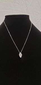 lot 653 image: SPG 18 box chain necklace with marquise cut diamond simulant solitaire pendant, Marked 925 Italy SPG