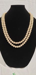lot 654 image: Richelieu double strand pearl necklace with Silver plate overside clasp, 28L, marked Richelieu