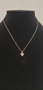 lot 705 image: Italian sterling silver 16L box chain (marked IJC Italy 925) with faceted heart crystal pendant (both pieces marked 925)