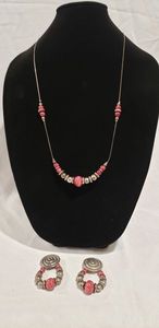 lot 648 image: Sterling (unmarked) 30L necklace and convertible clip earring set (top metal discs not sterling)