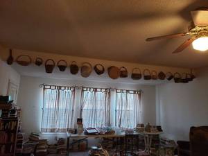 lot 158 image: Wicker Baskets hanging on wall