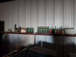 lot 403 image: Coca-Cola Bottles multiple sizes and other bottles Collection plus shelf items