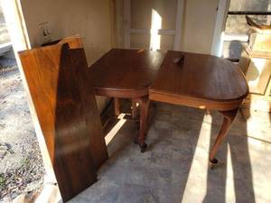 lot 828 image: Mahougany Dining table and two leaves.