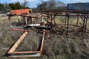 lot 681 image: Misc metal scrap including Large piping reel, metal door frames shelving unit and more