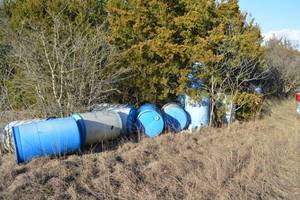 lot 555 image: large lot of Blue plastic 50 gallon cans