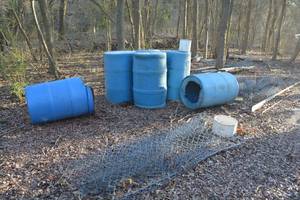 lot 559 image: Barrels used for Dog Kennels and Chain link fencing roles, and fence piping cross bars