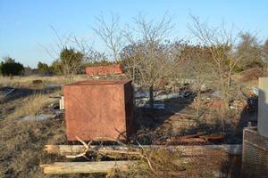 lot 600 image: Sheet Metal Scrap Pile, 4in PVC, cabling, fencing, angle iron, shelving, AC units tires and rims, bikes and more