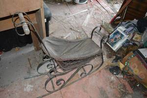 lot 607 image: late 1800 or early 1900s baby doll sled carriage. Very unique and rare.
