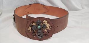 lot 784 image: Corral Belts Model 0140. Has Python snake skin and Lizard skin accents. (Size GrandeLarge). Attached buckle has an antiques cross with faux turquoise center stone.