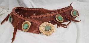 lot 785 image: Vintage artisan crafted tanned and tooled leather buckskin belt with applied deer horn antler and Green Mohave turquoise stones. Circa late 1970searly 1980s.