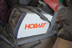 lot 365 image: Hobart Handler 135 Wire Feed Welder with Cart and Mask.