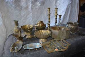 lot 616 image: large lot of Brass items including Candle Stick holders soap dishes vases and dishes