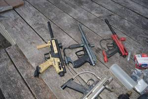 lot 832 image: large amount of Paint Ball supplies including guns, CO2 cartridges and containers and more