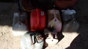 lot 573 image: Portable Gas Refill Tanks