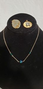 lot 834 image: Shell with gold trim Pendant, Sarah Coventry necklace with black stone, see pictures
