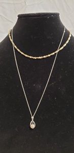 lot 838 image: ClassiQ Korea marked Gold Chain, Caged Pearl Necklace (Silver chain is broken but mark on pendant says sterling)