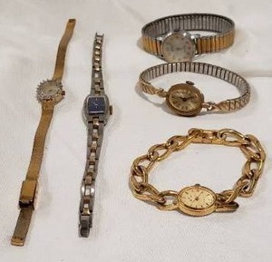lot 857 image: Deauville Armitron Watch with Crystals around the Face (Italy stamped on Band), Speidel Timex water resistant Watch with Elastic Band, Seiko Blue Face Watch, Elgin Chain Link Band Watch, and Timex Elastic Band Watch