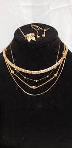 lot 844 image: Act II and Avon Gold Chains Plus Vile that reads 24 Karat Gold Alaska