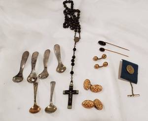 lot 845 image: Gold Cuff Links Stamped 18K, Tiny Sterling Spoon Shakers, Prayer beads marked Souvenir Anne De Beaupre France