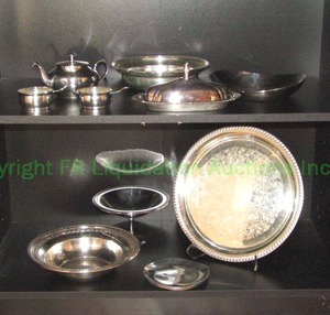 lot 7 image: Assorted silver plate serving ware as shown