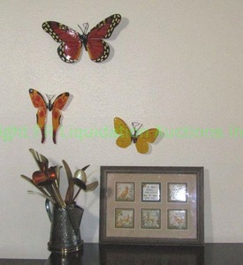 lot 10 image: Artist signed metal butterflies and flowers made in Mexico and framed print