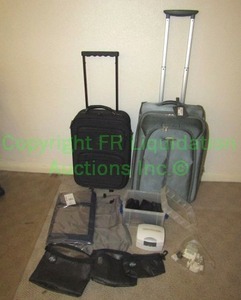 lot 29 image: Assorted luggage and travel organizers plus