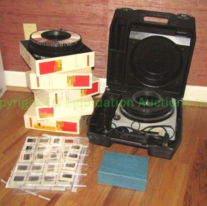 lot 12 image: Kodak Ektagraphic model AF-2 slide projector and carousels