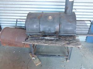 lot 2 image: EKCO Wood SMOKER  Grill has a side FIREBOX ,  one back wheel needs replaced, rusting wood needs replaced   72  length 53 tall 29 deep