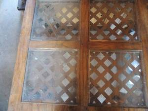 lot 50 image: Wood and glass end table with bottom shelf 29x29x24