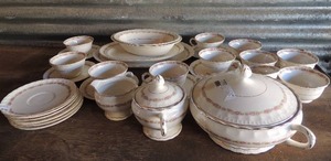 lot 59 image: Pope Grosser China Pink Floral  . 11 cups, sugar and creamer, soup dish, 12 small cup plates, 2 large platters 2 oval bowls 32 pieces