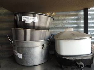 lot 64 image: Countertop Westbend slow cooker Bundt pans and cake pans