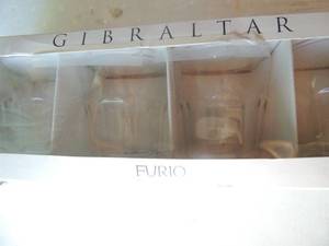 lot 83 image: set of 4 NIB Gibraltar drink glasses plus assorted pts. and pans
