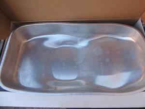 lot 96 image: Nascar aluminum cake pan and plane cake pan
