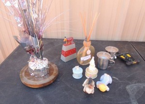 lot 97 image: Diffuser 2 metal handle creamer, party dcor, cow bell trinket box little boy sleeping