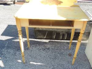 lot 121 image: Yellow desk with brown leaf design no drawer 34x32wide 17 deep