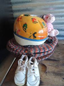 lot 124 image: 5 round seat cover cushions   child bike helmet   2 stuffed animals   pair of stride rite size 5.5 child shoes
