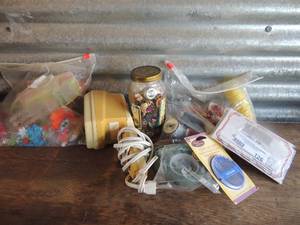 lot 126 image: Sewing lot- flowers, floral tape, thread, needles, jar of buttons, notions, Seamstress II steamer