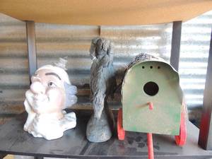 lot 129 image: Hanging wagon bird house, native American on horse statue crown head figurine