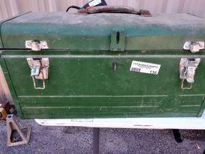 lot 136 image: Green toolbox with scrapers caulk box and crow bar