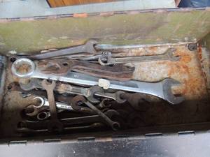 lot 18 image: Black toolbox with assorted wrenches