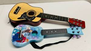 lot 27 image: 2 Kids Guitar Toy