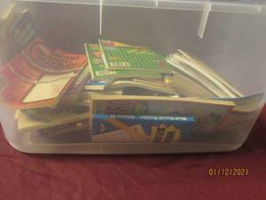 lot 111 image: GENEROUS AMOUNT OF WORD SEARCH BOOKS  TOTE NOT INCLUDED