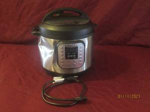lot 53 image: INSTANT POT ELECTRIC PRESSURE COOKER IP-DUO60 V2