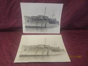 lot 59 image: 2 BLACK AND WHITE PICS OF MARINE JUMPER  11X14