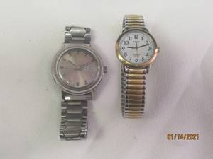 lot 16 image: 2 TIMEX STRETCH BAND SILVER WATCHES