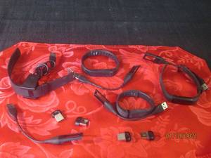 lot 170 image: 4 FITBITS WITH CHARGER AND WIRELESS SYNC DONGLE